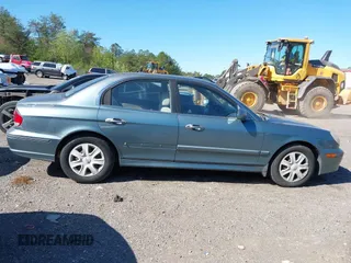 2004 Hyundai Sonata with VIN KMHWF25S74A048301, listed as a IAAI auction lot 41790506 with 179,740 mi miles. Bid and sale history available at carsss.com. Image 6.