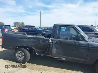 1992 Ford Ranger XLT z VIN 1FTCR10X3NUA73868, wystawiony jako IAAI lot #41836220 z przebiegiem 97 165 mil mil oraz . Historia ofert i sprzedaży dostępna na DreamBid. Obrazek 6.