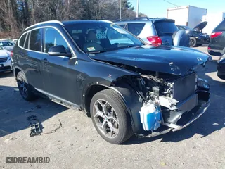2019 BMW X1 xDrive28i with VIN WBXHT3C50K5L35416, listed as a IAAI auction lot 41195144 with 75,643 mi miles. Bid and sale history available at carsss.com. Image 1.