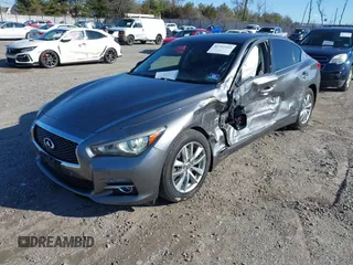 2015 Infiniti Q50 z VIN JN1BV7AR0FM397309, wystawiony jako IAAI lot #41752569 z przebiegiem 116 475 mil mil oraz . Historia ofert i sprzedaży dostępna na DreamBid. Obrazek 17.