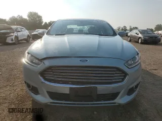 2014 Ford Fusion SE Hybrid with VIN 3FA6P0LU4ER106386, listed as a Copart auction lot 59627565 with 105,855 mi miles and Salvage title. Bid and sale history available at DreamBid. Image 5.