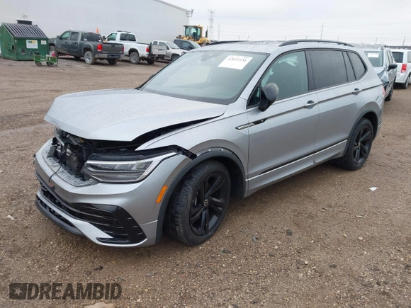 2023 Volkswagen Tiguan SE R-Line Black with VIN 3VV8B7AX3PM130610, listed as a IAAI auction lot 42011131 with 21,980 mi miles and . Bid and sale history available at DreamBid. Image 17.