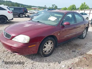 2005 Mercury Sable LS with VIN 1MEFM55S35A620072, listed as a IAAI auction lot 42760116 with 137,297 mi miles and . Bid and sale history available at DreamBid. Image 2.