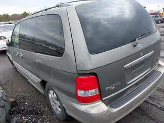 2005 Kia Sedona LX with VIN KNDUP132756687577, listed as a IAAI auction lot 41970855 with Not Provided miles and . Bid and sale history available at DreamBid. Image 3.