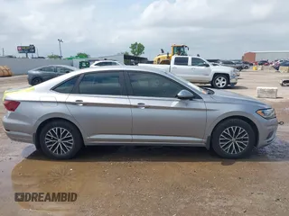 2021 Volkswagen Jetta S z VIN 3VWC57BU4MM094780, wystawiony jako IAAI lot #42103554 z przebiegiem 49 044 mil mil oraz . Historia ofert i sprzedaży dostępna na DreamBid. Obrazek 13.