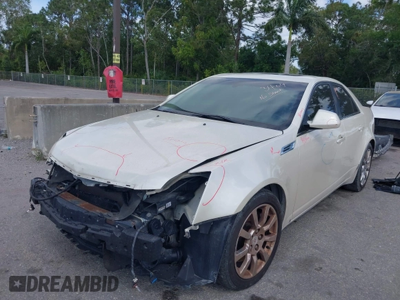 2008 Cadillac CTS RWD with VIN 1G6DV57V880128535, listed as a IAAI auction lot 39097540 with 153,140 mi miles and . Bid and sale history available at DreamBid. Image 2.