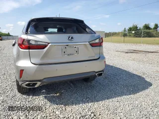 2018 Lexus RX 350 z VIN 2T2ZZMCAXJC095825, wystawiony jako Copart lot #54305925 z przebiegiem 84 615 mil mil oraz Szkoda całkowita • Salvage title. Historia ofert i sprzedaży dostępna na DreamBid. Obrazek 6.