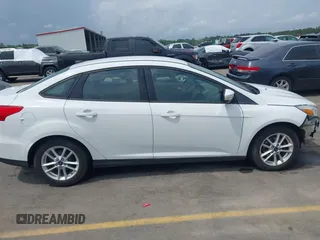 2015 Ford Focus SE with VIN 1FADP3F28FL204145, listed as a IAAI auction lot 42107720 with 129,441 mi miles and . Bid and sale history available at DreamBid. Image 14.