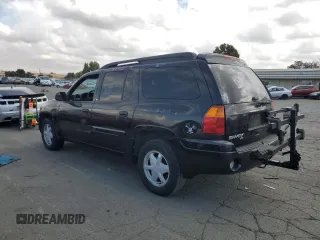2003 GMC Envoy SLT with VIN 1GKES16SX36220489, listed as a Copart auction lot 71859834 with 148,811 mi miles and Salvage Title. Bid and sale history available at DreamBid. Image 2.