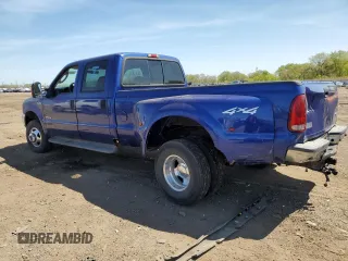 2003 Ford F-350 XL with VIN 1FTWW33P53EB90677, listed as a Copart auction lot 56300685 with 174,091 mi miles and Salvage title. Bid and sale history available at DreamBid. Image 2.