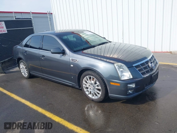 2009 Cadillac STS AWD w/1SB with VIN 1G6DD67V090151883, listed as a IAAI auction lot 42075438 with 97,408 mi miles. Bid and sale history available at carsss.com. Image 1.