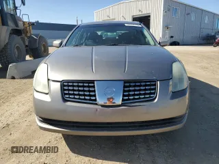 2004 Nissan Maxima SE z VIN 1N4BA41E24C877137, wystawiony jako Copart lot #52534115 z przebiegiem 219 798 mil mil oraz Szkoda całkowita • Salvage title. Historia ofert i sprzedaży dostępna na DreamBid. Obrazek 5.