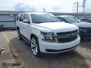 2019 Chevrolet Tahoe LT with VIN 1GNSCBKC6KR345154, listed as a IAAI auction lot 41808536 with 124,325 mi miles. Bid and sale history available at carsss.com. Image 1.