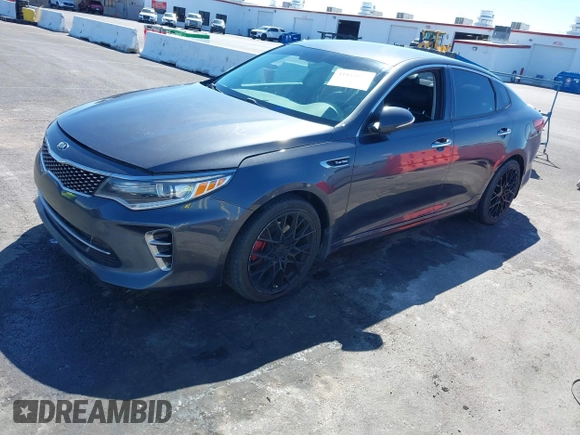 2016 Kia Optima SX Turbo with VIN 5XXGW4L29GG091635, listed as a IAAI auction lot 41884813 with 121,764 mi miles and . Bid and sale history available at carsss.com. Image 2.