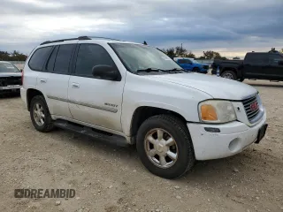 2006 GMC Envoy SLT with VIN 1GKDS13S362197312, listed as a Copart auction lot 83999074 with 217,220 mi miles and Clean Title. Bid and sale history available at carsss.com. Image 4.