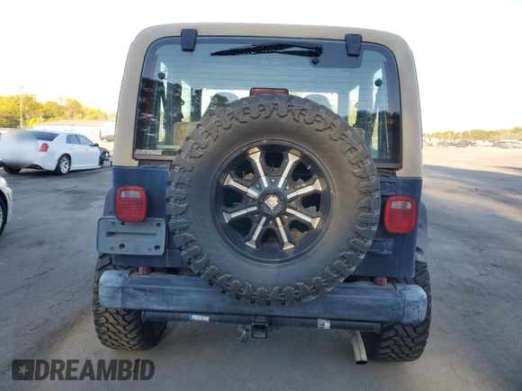 2001 Jeep Wrangler Sport with VIN 1J4FA49S21P346900, listed as a Copart auction lot 75439604 with 128,824 mi miles and Clean Title. Bid and sale history available at carsss.com. Image 6.
