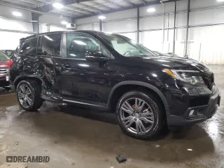 2021 Honda Passport EX-L with VIN 5FNYF8H59MB024627, listed as a Copart auction lot 40298943 with 39,970 mi miles. Bid and sale history available at carsss.com. Image 4.