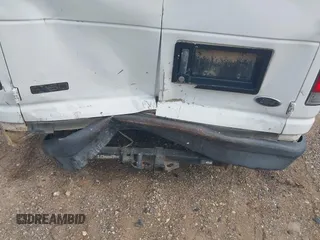 2004 Ford Econoline Cargo with VIN 1FTRE14WX4HA06537, listed as a IAAI auction lot 41745018 with 246,963 mi miles. Bid and sale history available at carsss.com. Image 12.