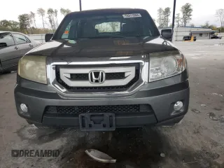 2011 Honda Pilot EX-L with VIN 5FNYF4H57BB047605, listed as a Copart auction lot 76311264 with 207,561 mi miles and Salvage Title. Bid and sale history available at carsss.com. Image 5.