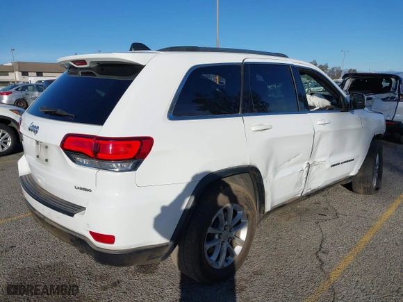 2021 Jeep Grand Cherokee Laredo X with VIN 1C4RJEAG2MC719395, listed as a IAAI auction lot 41338484 with 99,636 mi miles. Bid and sale history available at carsss.com. Image 4.