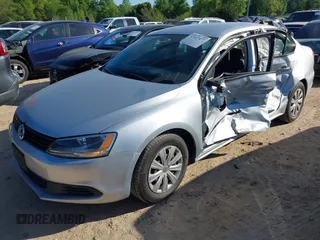 2014 Volkswagen Jetta Sedan S with VIN 3VW2K7AJ4EM208158, listed as a IAAI auction lot 42037477 with 156,483 mi miles. Bid and sale history available at carsss.com. Image 17.