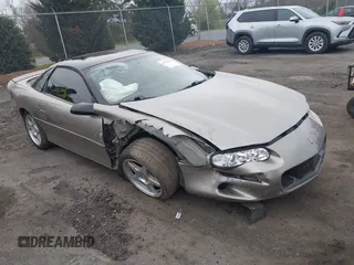 1999 Chevrolet Camaro z VIN 2G1FP22K2X2116432, wystawiony jako IAAI lot #41931771 z przebiegiem 124 879 mil mil oraz . Historia ofert i sprzedaży dostępna na DreamBid. Obrazek 1.
