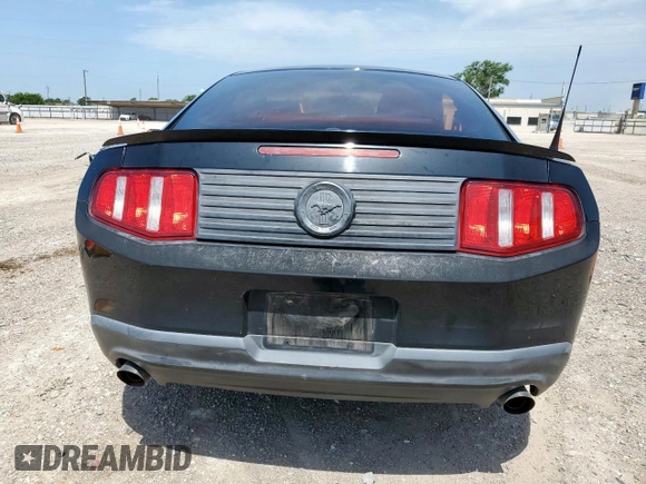 2012 Ford Mustang Premium z VIN 1ZVBP8AM6C5246219, wystawiony jako Copart lot #61443795 z przebiegiem 98 794 mil mil oraz Szkoda całkowita • Salvage title. Historia ofert i sprzedaży dostępna na DreamBid. Obrazek 6.