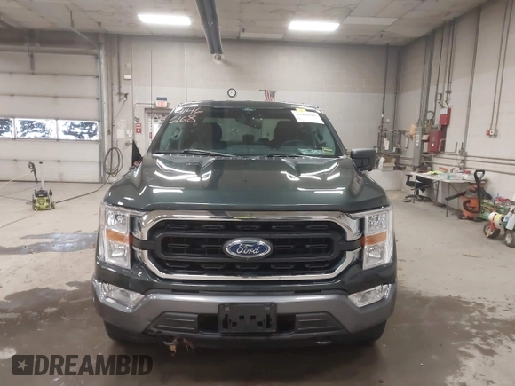 2021 Ford F-150 XL with VIN 1FTFW1E59MKD82204, listed as a IAAI auction lot 41466186 with 56,839 mi miles. Bid and sale history available at carsss.com. Image 12.