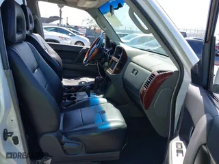 2003 Mitsubishi Montero LTD with VIN JA4NW51S43J017989, listed as a IAAI auction lot 41963880 with 161,443 mi miles. Bid and sale history available at carsss.com. Image 5.