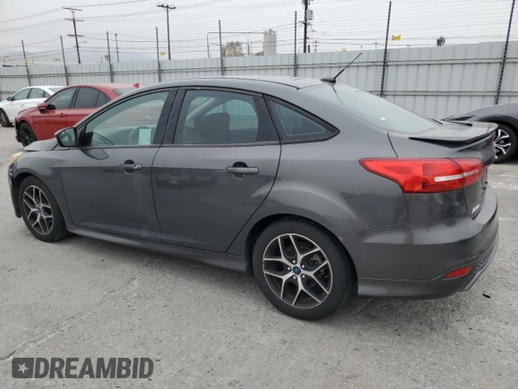 2016 Ford Focus SE z VIN 1FADP3F23GL405565, wystawiony jako Copart lot #60173935 z przebiegiem 82 167 mil mil oraz Szkoda całkowita • Salvage title. Historia ofert i sprzedaży dostępna na DreamBid. Obrazek 2.