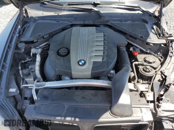2011 BMW X5 35d with VIN 5UXZW0C58BL662048, listed as a Copart auction lot 55648975 with 166,291 mi miles and Salvage title. Bid and sale history available at DreamBid. Image 12.