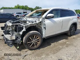 2019 Toyota Highlander SE with VIN 5TDJZRFH1KS594741, listed as a Copart auction lot 57666825 with 102,296 mi miles and Salvage title. Bid and sale history available at DreamBid. Image 1.