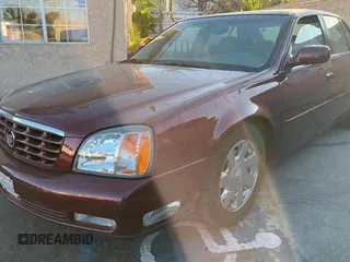 2002 Cadillac DeVille DTS with VIN 1G6KF57912U135771, listed as a Copart auction lot 82052554 with 56,268 mi miles and Clean Title. Bid and sale history available at carsss.com. Image 2.