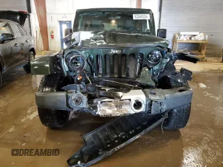 2011 Jeep Wrangler Unlimited Sahara with VIN 1J4BA5H17BL592752, listed as a Copart auction lot 83344334 with 176,259 mi miles and Clean Title. Bid and sale history available at carsss.com. Image 5.