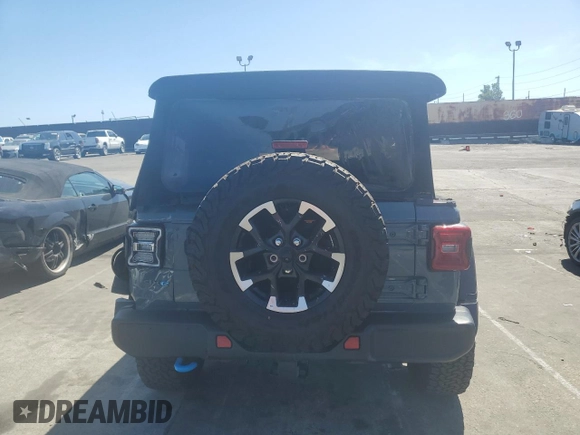 2024 Jeep Wrangler Rubicon с VIN 1C4RJXR60RW317288, выставлен на аукционе Copart как лот 49910465 с пробегом 3 259 миль миль и Списание • Salvage title. История ставок и продаж доступна на DreamBid. Изображение 6.