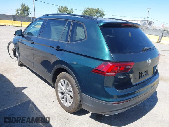 2018 Volkswagen Tiguan S with VIN 3VV1B7AX1JM165641, listed as a IAAI auction lot 42699622 with 75,354 mi miles and . Bid and sale history available at DreamBid. Image 3.