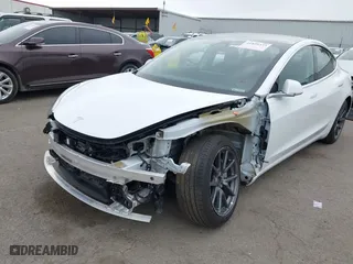 2019 Tesla Model 3 Long Range with VIN 5YJ3E1EB2KF361541, listed as a IAAI auction lot 41859373 with 54,664 mi miles. Bid and sale history available at carsss.com. Image 6.
