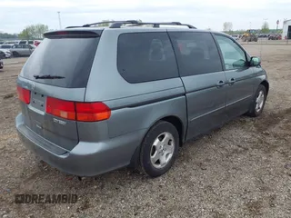 2000 Honda Odyssey EX z VIN 2HKRL1879YH516264, wystawiony jako IAAI lot #42109480 z przebiegiem 214 414 mil mil oraz . Historia ofert i sprzedaży dostępna na DreamBid. Obrazek 4.