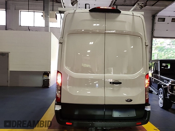 2023 Ford Transit Cargo z VIN 1FTBR1X85PKC00581, wystawiony jako IAAI lot #42900680 z przebiegiem 8 386 mil mil oraz . Historia ofert i sprzedaży dostępna na DreamBid. Obrazek 17.