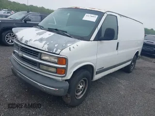 2002 Chevrolet Express Cargo with VIN 1GCHG35R621159402, listed as a IAAI auction lot 42170093 with Not provided miles and . Bid and sale history available at DreamBid. Image 2.