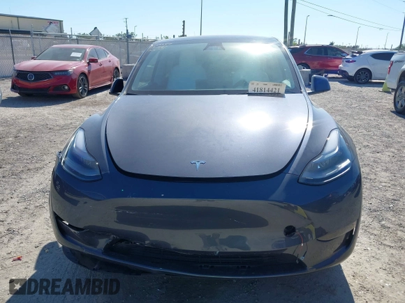 2023 Tesla Model Y Long Range with VIN 7SAYGDEE1PA203937, listed as a IAAI auction lot 41814421 with 9,138 mi miles. Bid and sale history available at carsss.com. Image 11.