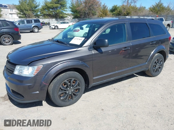 2017 Dodge Journey SE with VIN 3C4PDCAB0HT701026, listed as a IAAI auction lot 41797969 with 80,477 mi miles and . Bid and sale history available at DreamBid. Image 19.