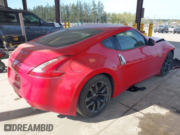 2016 Nissan 370Z with VIN JN1AZ4EH6GM931396, listed as a IAAI auction lot 42034122 with 16,477 mi miles. Bid and sale history available at carsss.com. Image 4.