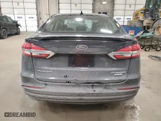 2020 Ford Fusion Hybrid Titanium with VIN 3FA6P0RU3LR233957, listed as a Copart auction lot 84908134 with 71,666 mi miles and Salvage Title. Bid and sale history available at carsss.com. Image 6.