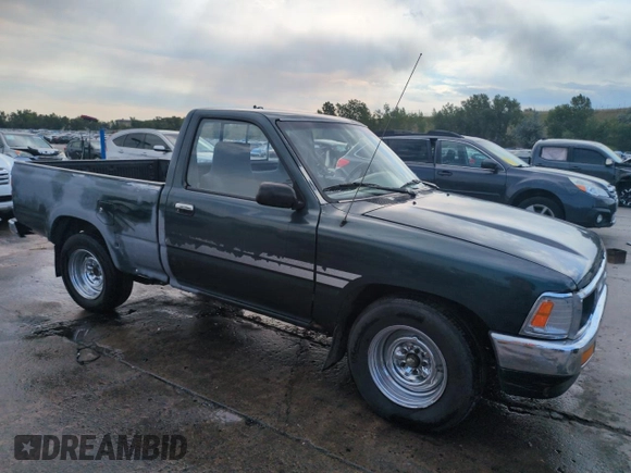 1994 Toyota Pickup DX with VIN JT4RN81PXR5174113, listed as a Copart auction lot 64211905 with 209,694 mi miles and Salvage title. Bid and sale history available at DreamBid. Image 4.