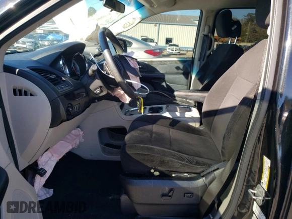 2014 Dodge Grand Caravan SXT z VIN 2C4RDGCG3ER155734, wystawiony jako Copart lot #86000724 z przebiegiem 175 681 mil mil oraz Szkoda całkowita • Salvage title. Historia ofert i sprzedaży dostępna na DreamBid. Obrazek 7.