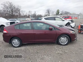 2011 Honda Insight LX z VIN JHMZE2H52BS004304, wystawiony jako IAAI lot #41827541 z przebiegiem 141 072 mil mil oraz . Historia ofert i sprzedaży dostępna na DreamBid. Obrazek 13.