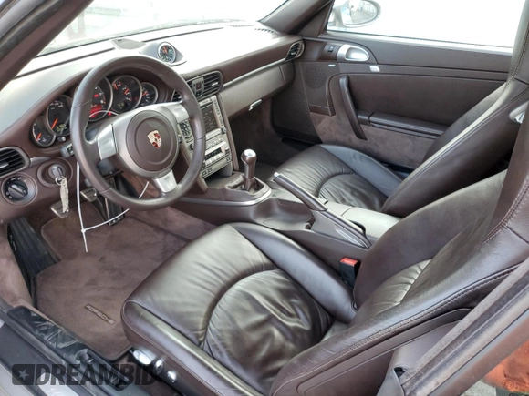 2006 Porsche 911 Carrera with VIN WP0CA29926S757017, listed as a Copart auction lot 67712714 with 61,865 mi miles and Salvage Title. Bid and sale history available at DreamBid. Image 8.