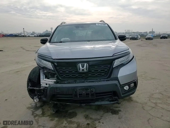 2019 Honda Passport Elite with VIN 5FNYF8H04KB028344, listed as a Copart auction lot 87702485 with 57,933 mi miles and Salvage Title. Bid and sale history available at carsss.com. Image 11.