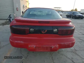 1998 Pontiac Firebird Firebird z VIN 2G2FS22K0W2201603, wystawiony jako Copart lot #79671704 z przebiegiem 309 203 mil mil oraz Czysty tytuł • Clean title. Historia ofert i sprzedaży dostępna na DreamBid. Obrazek 6.